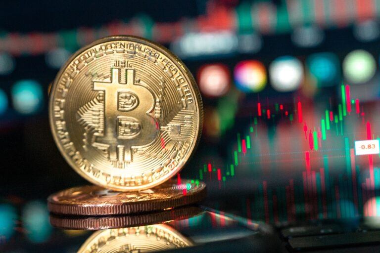 gold bitcoin in front of price chart 768x512.jpg