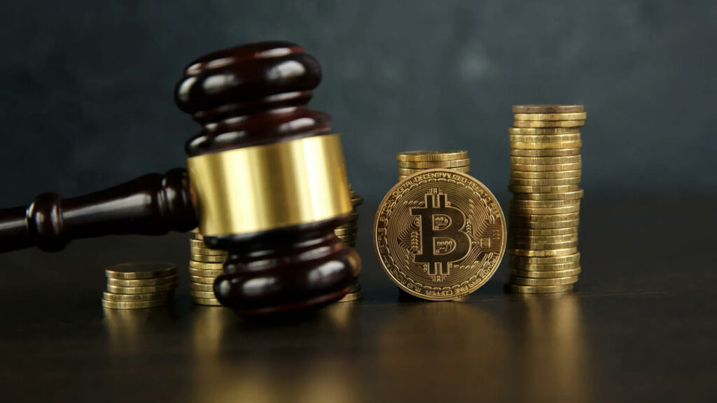 tinywow tinywow Auction gavel and bitcoin cryptocurrency money on a wooden desk 59647278 59647325.jpg